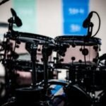 black drum set shallow focus photography