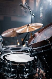 brown and white drum set