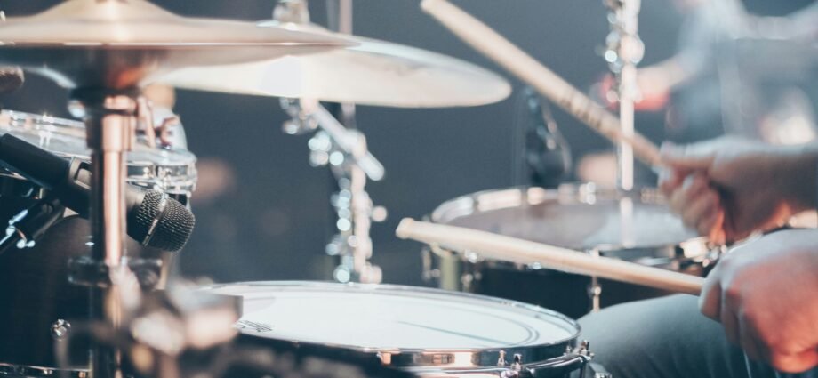 person playing drums