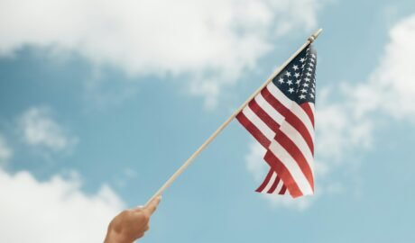 person holding U.S.A. flag